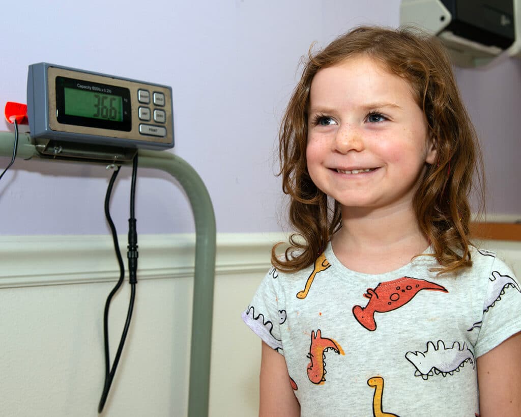 Bethesda Pediatrics - A doctor checking a baby girl heartbeat